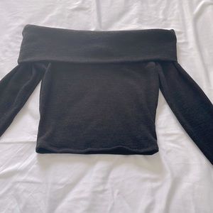 Black sweater, off sleeve
